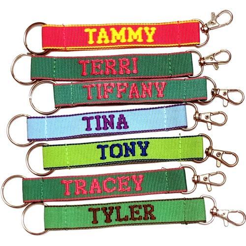 Wholesale Bundle of 100 - Embroidered Novelty Keychains - Nylon Key Strap & Clip (1" x 7.75") Assorted Names & Phrases - Dollar Fanatic