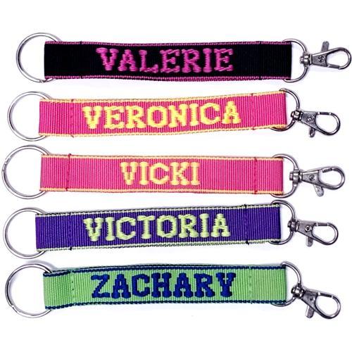Wholesale Bundle of 100 - Embroidered Novelty Keychains - Nylon Key Strap & Clip (1" x 7.75") Assorted Names & Phrases - Dollar Fanatic